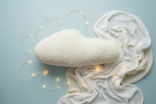 Cozy Cloud - Flat Lay with Two Blankets & Twinkling Lights. Cream colored Cloud crocheted